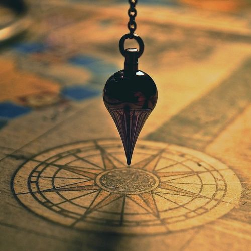 Divination: How does a yes-no pendulum work?
